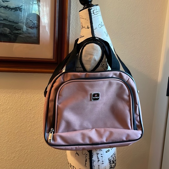 Tag Heuer Handbags - TAG HEUER Messenger bag mauve and black colored.